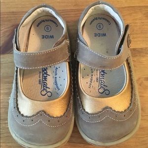 Brown and gold girls shoes